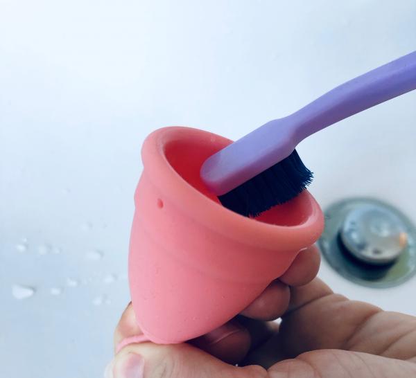 LUNACUP menstrual cup cleaning with toothbrush 